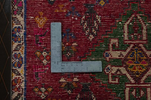 Backside of handmade 2000s Shiraz rug showing knot structure and weave density