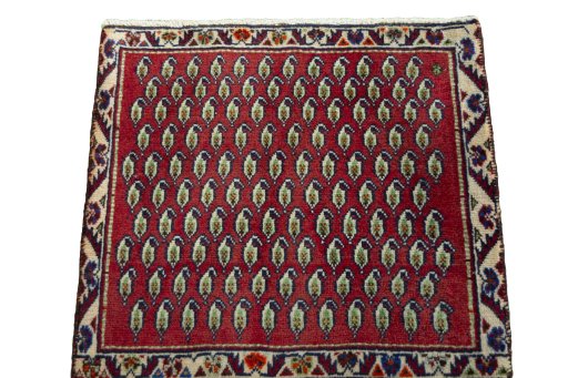 Surface texture of 2000s Shiraz rug with natural Wool and intricate pattern