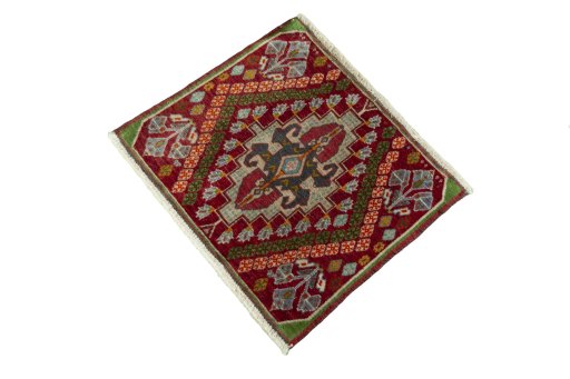 Corner detail of 2000s Shiraz rug showing border pattern and Wool pile
