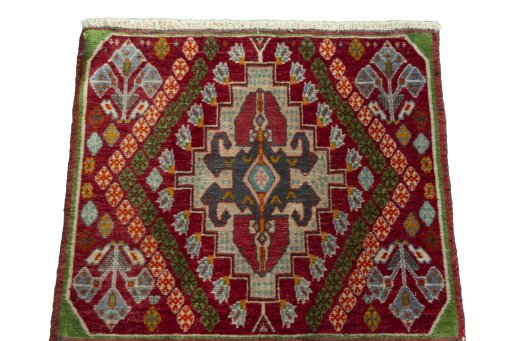 Surface texture of 2000s Shiraz rug with natural Wool and intricate pattern