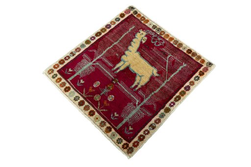 Corner detail of 2000s Shiraz rug showing border pattern and Wool pile