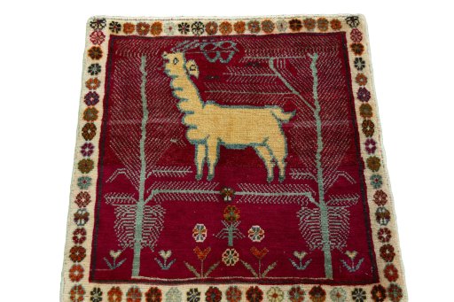 Surface texture of 2000s Shiraz rug with natural Wool and intricate pattern