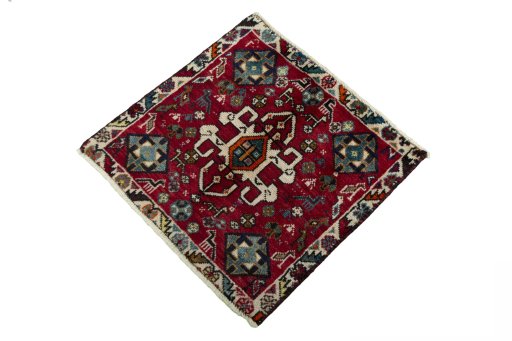 Corner detail of 2000s Shiraz rug showing border pattern and Wool pile