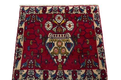 Surface texture of 2000s Shiraz rug with natural Wool and intricate pattern