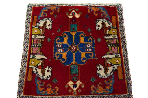 Surface texture of 2000s Shiraz rug with natural Wool and intricate pattern
