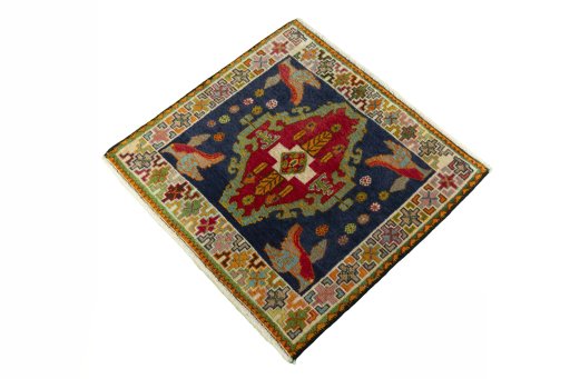Corner detail of 2000s Shiraz rug showing border pattern and Wool pile