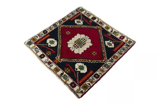 Corner detail of 2000s Shiraz rug showing border pattern and Wool pile