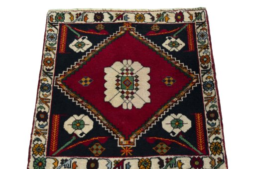 Surface texture of 2000s Shiraz rug with natural Wool and intricate pattern