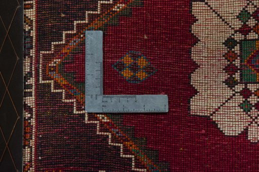 Backside of handmade 2000s Shiraz rug showing knot structure and weave density