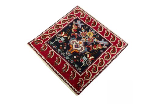 Corner detail of 2000s Shiraz rug showing border pattern and Wool pile