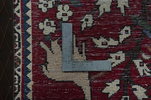 Backside of handmade 2000s Shiraz rug showing knot structure and weave density