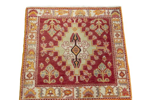 Surface texture of 2000s Shiraz rug with natural Wool and intricate pattern