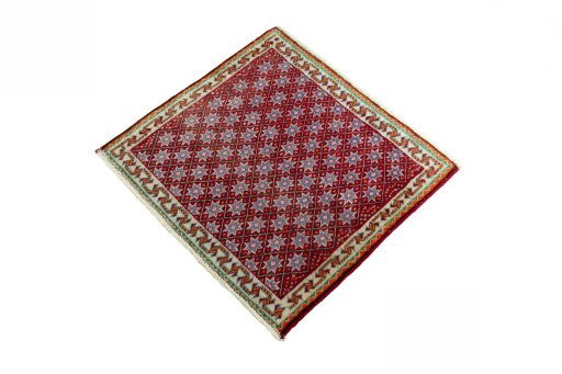 Corner detail of 2000s Shiraz rug showing border pattern and Wool pile