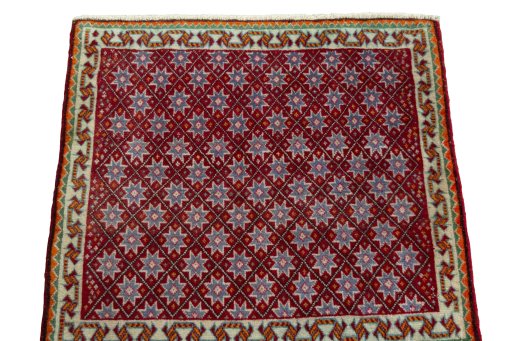 Surface texture of 2000s Shiraz rug with natural Wool and intricate pattern