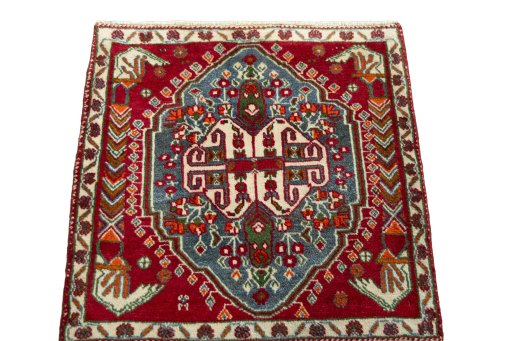Surface texture of 2000s Shiraz rug with natural Wool and intricate pattern