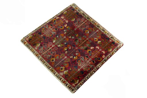 Corner detail of 2000s Shiraz rug showing border pattern and Wool pile