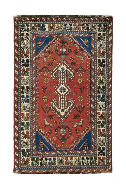Full view of 2000s Shiraz rug from Iran / Persia, 124 × 79 cm in Red tones