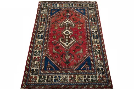Surface texture of 2000s Shiraz rug with natural Wool and intricate pattern