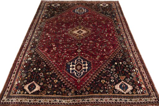 Surface texture of 2000s Shiraz rug with natural Wool and intricate pattern