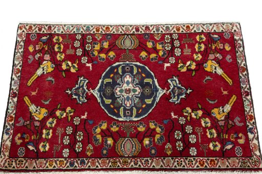 Surface texture of 2000s Shiraz rug with natural Wool and intricate pattern