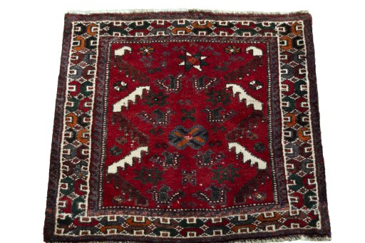 Surface texture of 2000s Shiraz rug with natural Wool and intricate pattern
