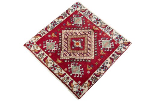 Corner detail of 2000s Shiraz rug showing border pattern and Wool pile