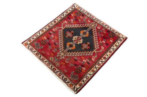Corner detail of 2000s Shiraz rug showing border pattern and Wool pile