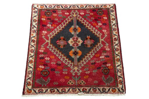 Surface texture of 2000s Shiraz rug with natural Wool and intricate pattern