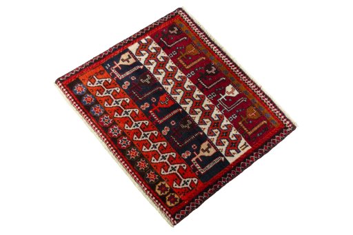 Corner detail of 2000s Shiraz rug showing border pattern and Wool pile