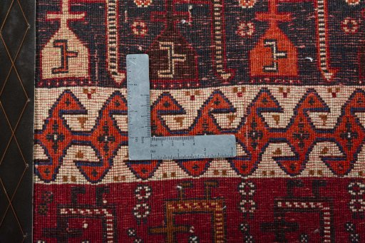 Backside of handmade 2000s Shiraz rug showing knot structure and weave density