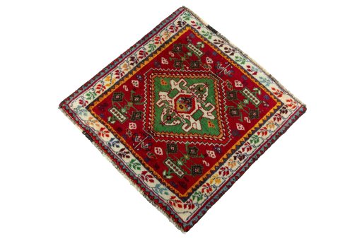 Corner detail of 2000s Shiraz rug showing border pattern and Wool pile