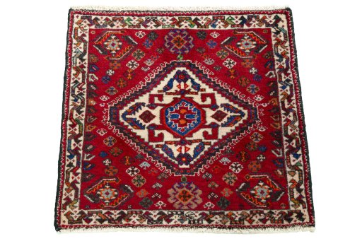 Surface texture of 2000s Shiraz rug with natural Wool and intricate pattern