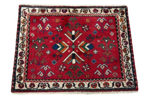 Surface texture of 2000s Shiraz rug with natural Wool and intricate pattern