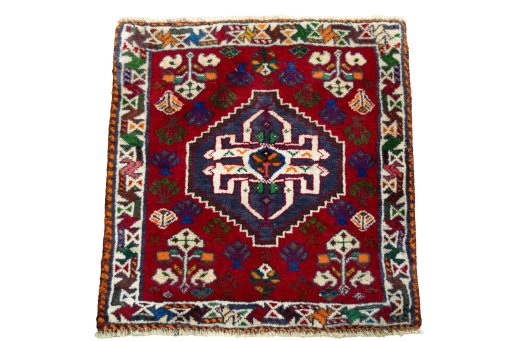 Surface texture of 2000s Shiraz rug with natural Wool and intricate pattern