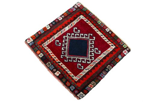 Corner detail of 2000s Shiraz rug showing border pattern and Wool pile