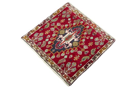 Corner detail of 2000s Shiraz rug showing border pattern and Wool pile
