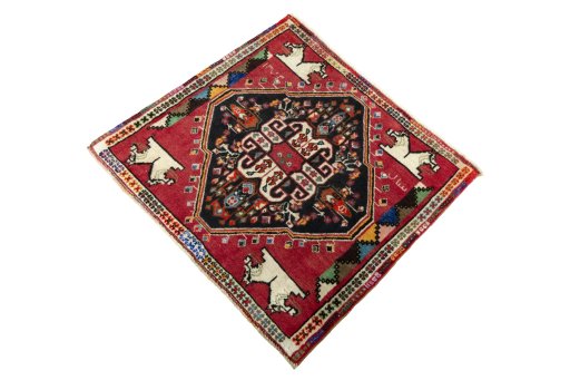 Corner detail of 2000s Shiraz rug showing border pattern and Wool pile
