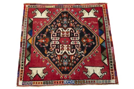 Surface texture of 2000s Shiraz rug with natural Wool and intricate pattern