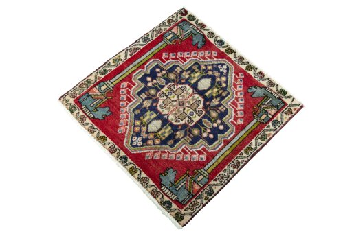 Corner detail of 2000s Shiraz rug showing border pattern and Wool pile