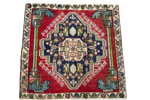 Surface texture of 2000s Shiraz rug with natural Wool and intricate pattern