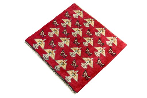Corner detail of 2000s Shiraz rug showing border pattern and Wool pile