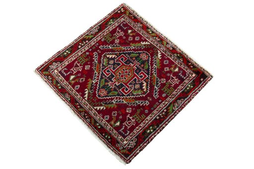 Corner detail of 2000s Shiraz rug showing border pattern and Wool pile