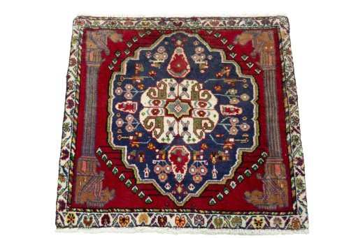 Surface texture of 2000s Shiraz rug with natural Wool and intricate pattern