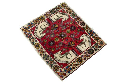 Corner detail of 2000s Shiraz rug showing border pattern and Wool pile
