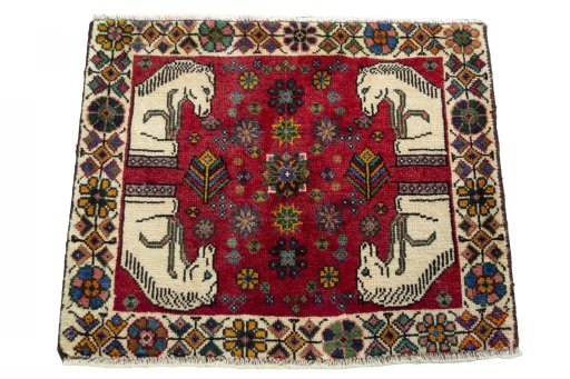Surface texture of 2000s Shiraz rug with natural Wool and intricate pattern