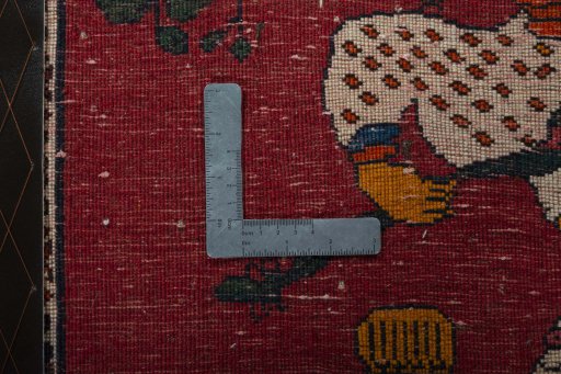 Backside of handmade 2000s Shiraz rug showing knot structure and weave density