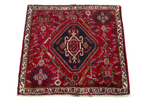 Surface texture of 2000s Shiraz rug with natural Wool and intricate pattern