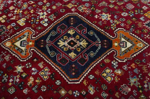 Central medallion detail of 2000s Shiraz rug from Iran / Persia