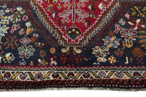Close-up detail of 2000s Shiraz rug from Iran / Persia showing Wool weave