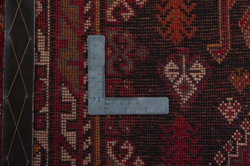 Surface texture of 2000s Shiraz rug with natural Wool and intricate pattern